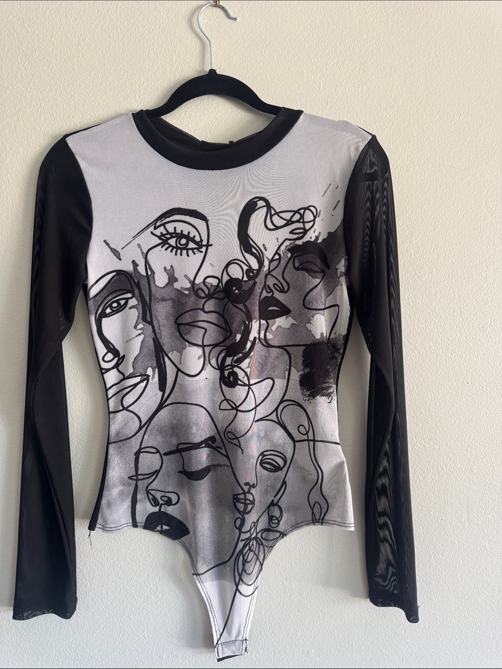 Fashion Nova Black & White Abstract Faces Long-Sleeve Bodysuit